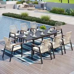 Captiva Designs 9pc Outdoor Patio Rectangle Black Metal Table & Beige Rattan Cushioned Chairs -Furniture GUEST 03fdb923 9c6f 48b8 8bb7 2f534b93d768